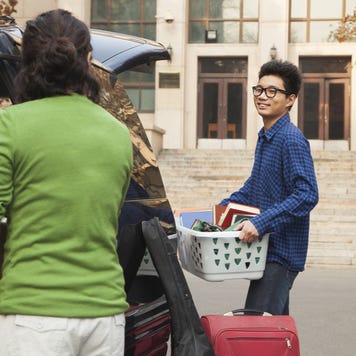 Parents help college student move into dorms