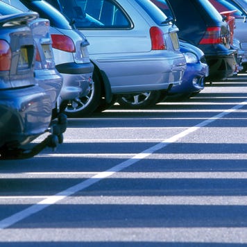 A line of cars positioned diagonally to the left