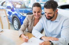 Couple signs auto lease