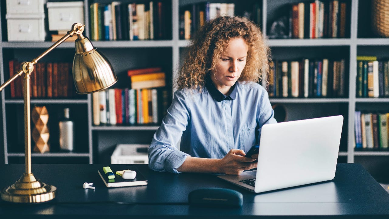 woman on laptop in home office