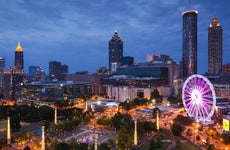 Atlanta, elevated city view with ferris wheel, dusk