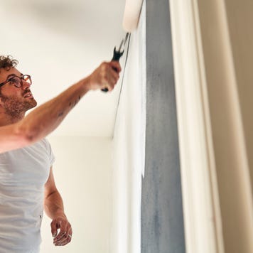 A man painting a wall