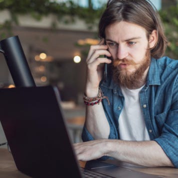 Young man working on laptop