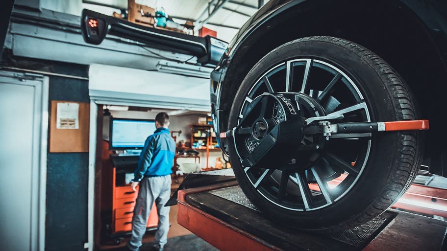 Close-up of a tire during wheel alignment