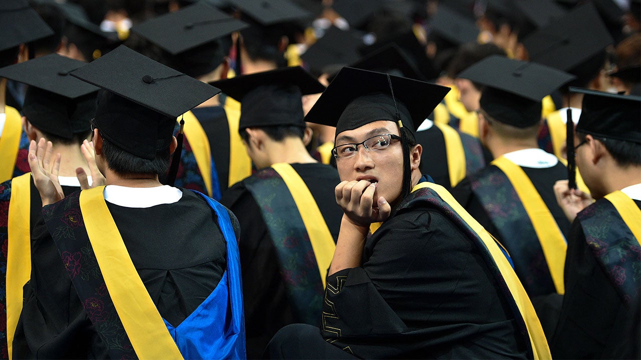 University student sits a graduation