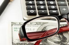 Calculator, eyeglasses and a $100 bill  © doomu - Fotolia.com