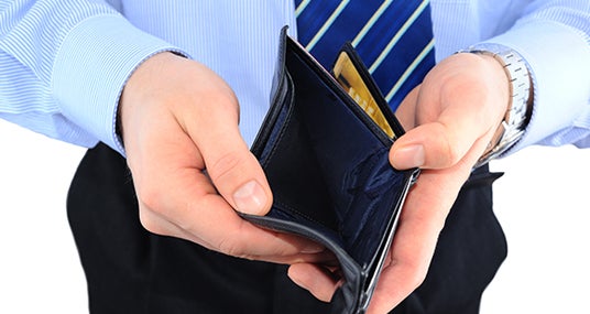 Businessman holding empty wallet © Temych - Fotolia.com