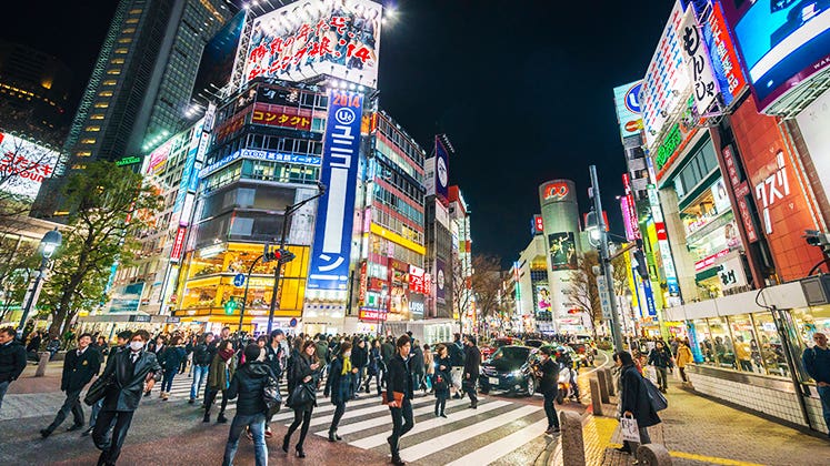 Bright lights, nighttime in Shibuya, Japan © iStock