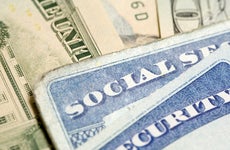 Social security cards and money © iStock