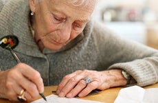 Older woman writing © Konstantin Sutyagin/Shutterstock.com