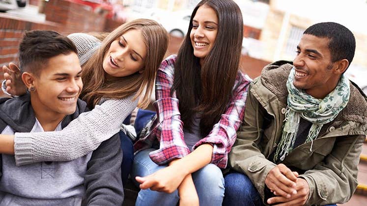 Millennial friends hanging out | PeopleImages/Getty Images