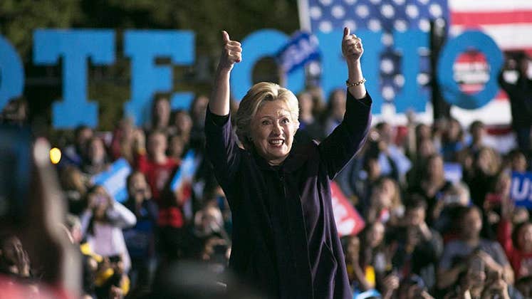 Hillary Clinton two thumbs-up in rally | Maddie McGarvey/Getty Images