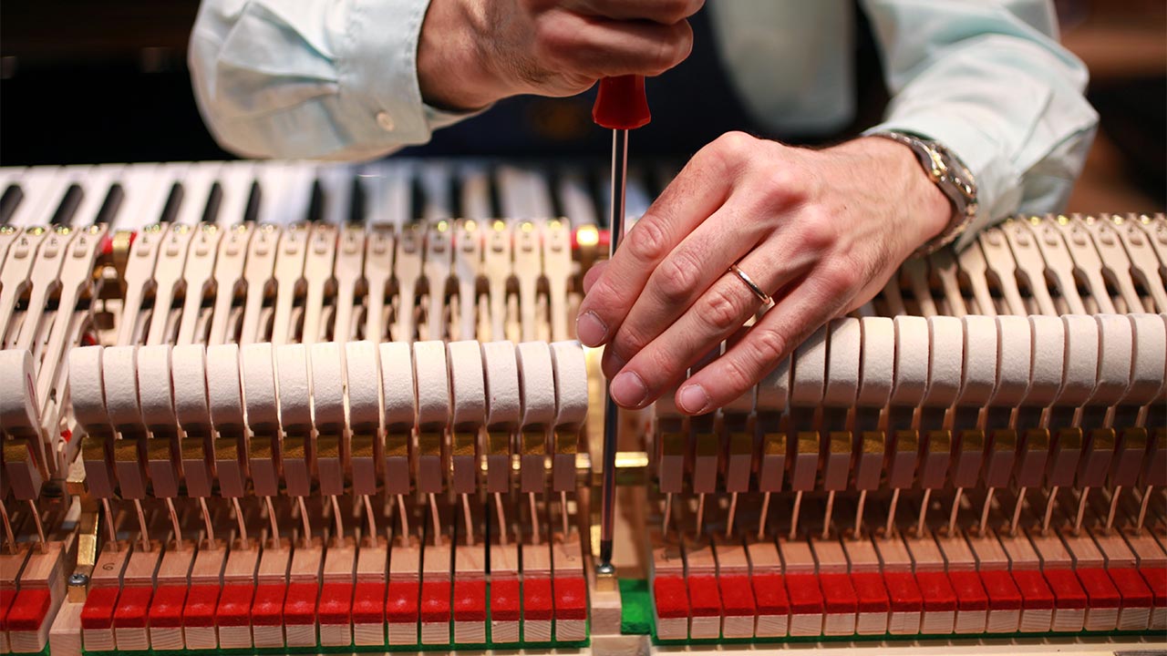 how much does it cost to tune a piano