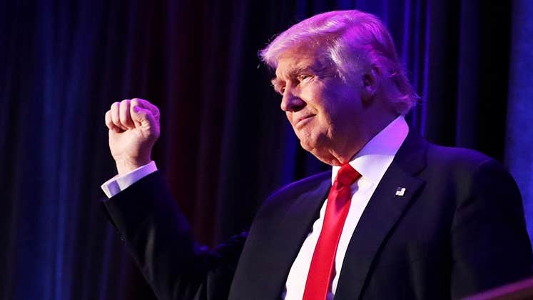 President-elect Donald Trump holding fist up | Joe Raedle/Getty Images