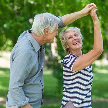 Seniors dancing outside | wavebreakmedia/Shutterstock.com