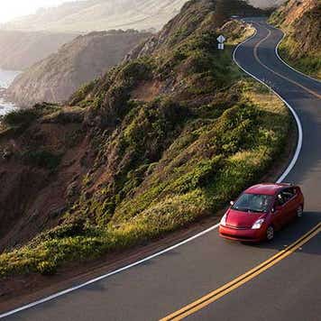 Car driving down zigzag road | Michael Hanson/Getty Images