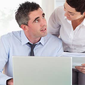 Couple man at a computer reviewing documents © wavebreakmedia/Shutterstock.com