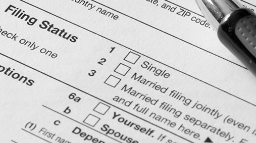 Close up of Form 1040, emphasis on filing status