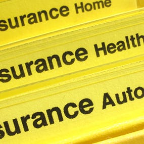Insurance policies in their own yellow folder © Kellis/Shutterstock.com