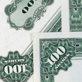 Common stock certificates © Tupungato/Shutterstock.com