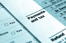 Payments and tax © Claudio Divizia/Shutterstock.com