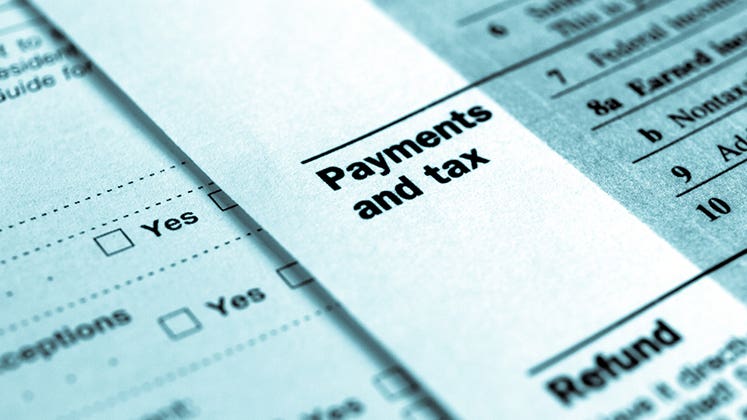 Payments and tax © Claudio Divizia/Shutterstock.com