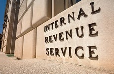 IRS building sign | Pgiam/Getty Images