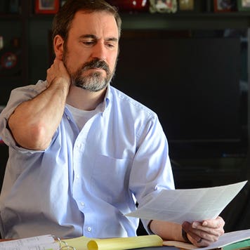 Man budgeting in office