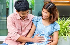 Couple expecting a baby | Gastuner/Shutterstock.com