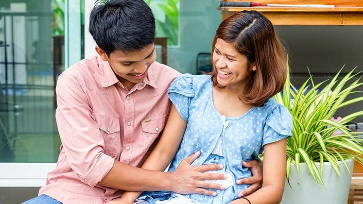Couple expecting a baby | Gastuner/Shutterstock.com