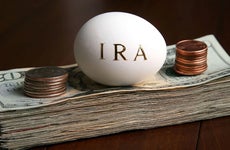 IRA egg on money © iStock