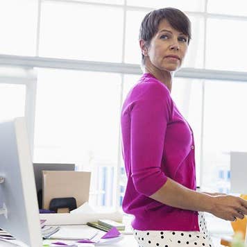 Woman working in bright, open office space | Hero Images/Getty Images