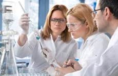 Chemists working in laboratory