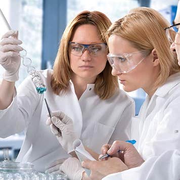 Chemists working in laboratory