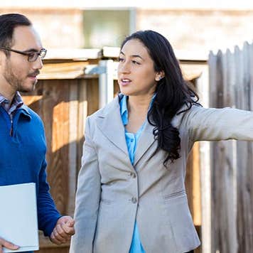 Realtor showing property | asiseeit/Getty Images