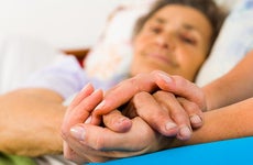 Holding hands in the hospital © Lighthunter/Shutterstock.com