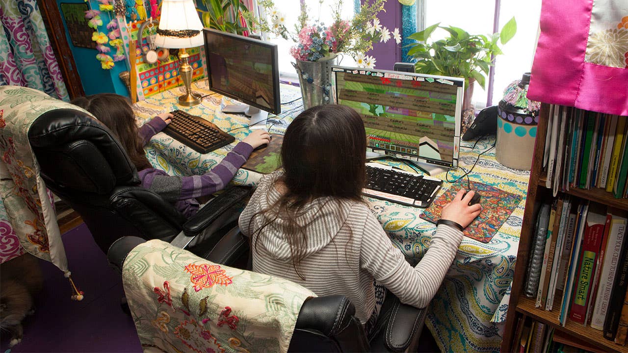 two girls playing Minecraft