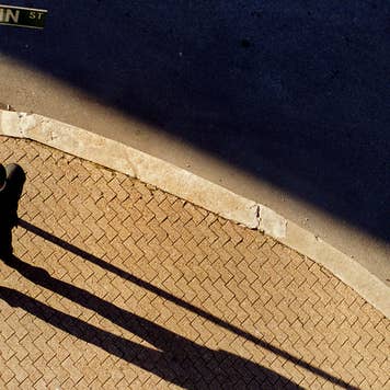 Man with a long shadow