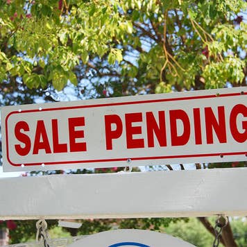 "Sale pending" sign outside a home