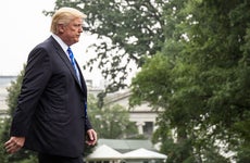Trump walks across White House lawn