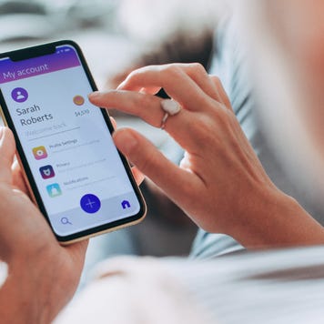 Woman using a banking app on her phone