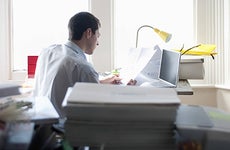 Man sitting in home office © bikeriderlondon/Shutterstock.com
