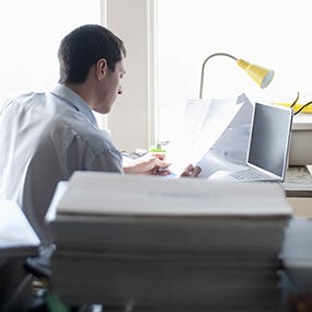 Man sitting in home office © bikeriderlondon/Shutterstock.com