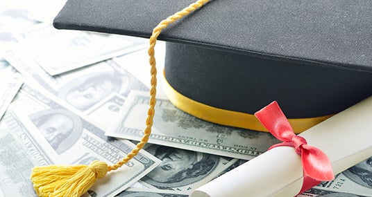 Graduation cap, diploma, money © pogonici/Shutterstock.com