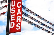 Used cars banner | Pamela Moore/E+/Getty Images