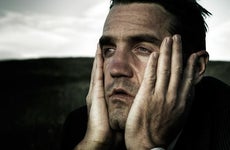 Close up of regretful man | Rawpixel Ltd/E+/Getty Images