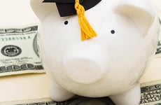 Piggy bank wearing graduation cap © karen roach/Shutterstock.com
