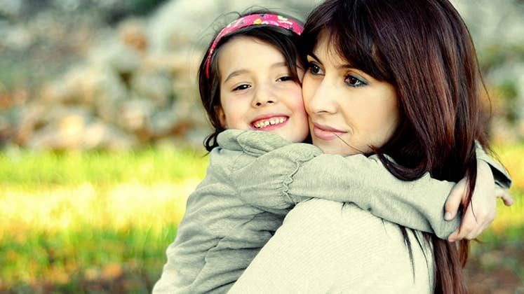 Mother and daughter outdoors © iStock