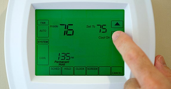 Buy a programmable thermostat © iStock