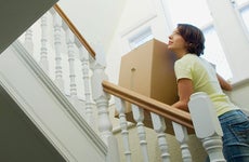 Woman moving into her home